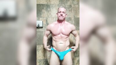 Muscle stud eats his own cum in gym shower after workout