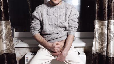 A young guy jerks off his dick and cums loudly