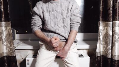 A young guy jerks off his dick and cums loudly