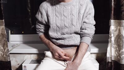 A young guy jerks off his dick and cums loudly