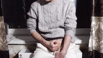 A young guy jerks off his dick and cums loudly
