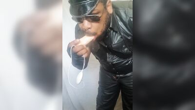 Playing with Telescopic Dildo in Leather
