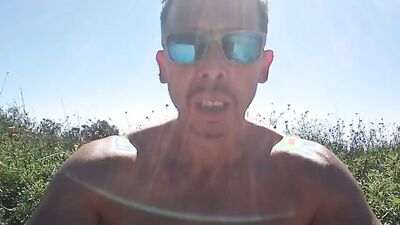 Muscular guy public masturbation at a popular park. People passing by...interrupting him! RISKY!!!