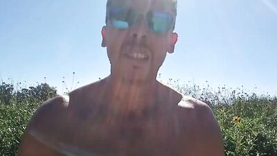 Muscular guy public masturbation at a popular park. People passing by...interrupting him! RISKY!!!