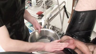 Rubber Loving Duo in Hard Action