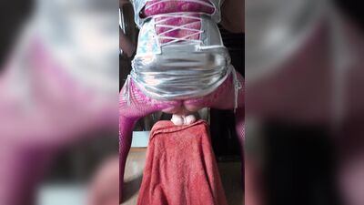 Sissy squirts piss through the cock cage while stretching her anal pussy with big toys