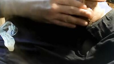 Cumming into used condom - another man's cum on my balls
