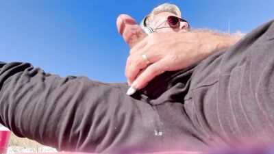 Rubbing my big cock on the beach until I blow my load