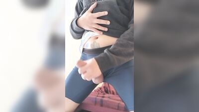 I take my cock out of my boxer shorts and jerk off with a condom while my neighbor sees me
