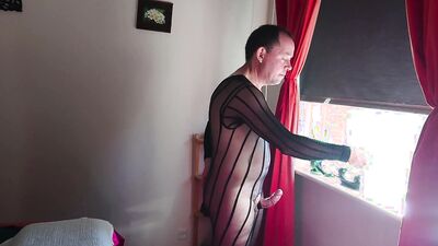 crossdresser plays with her stiff cock in naughty nylon lingerie