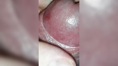 Close up precum and foreskin play