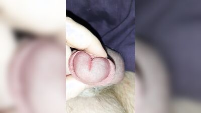 Close up precum and foreskin play
