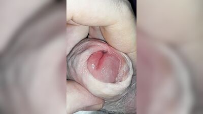 Close up precum and foreskin play