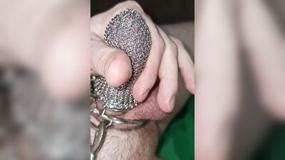 Penis chastity cage with chainmail. Can I jerkoff and cum?