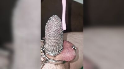 Penis chastity cage with chainmail. Can I jerkoff and cum?
