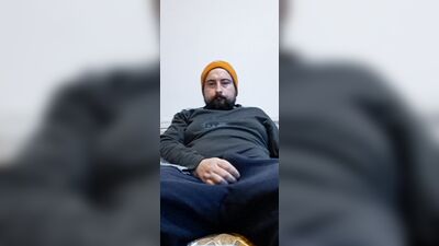 bearded male eating Owen cum