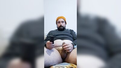 bearded male eating Owen cum