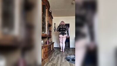 Sissy shows here again in dessous but with chasity cage and boypussy