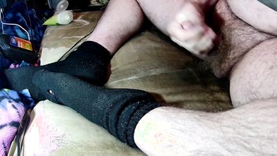 I'm masturbating again with my black socks still on