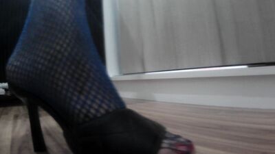 Giving a Footjob after teasing you with long toenails claws, soles, fishnets and sandals