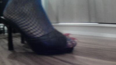 Giving a Footjob after teasing you with long toenails claws, soles, fishnets and sandals