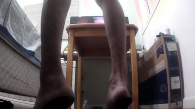 Giving a Footjob after teasing you with long toenails claws, soles, fishnets and sandals