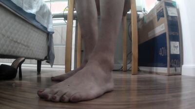 Giving a Footjob after teasing you with long toenails claws, soles, fishnets and sandals