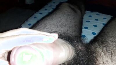 Extremely hairy young guy masturbates before sleep