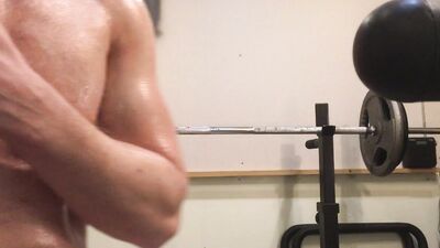 Oiled up Muscle Daddy poses and flexes and jerks his big 7" cock