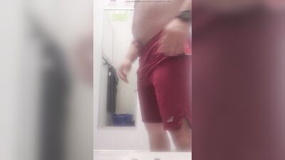 Trying on clothes at the sports store