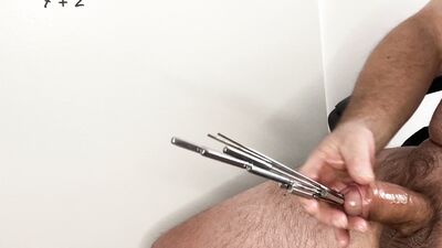 Seven sounds in cock. Extreme urethral sounding. Multiple sounds in cock. Cock urethral stuffing.
