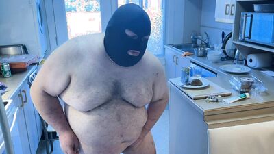Pluged SuperChub cleans his kitchen
