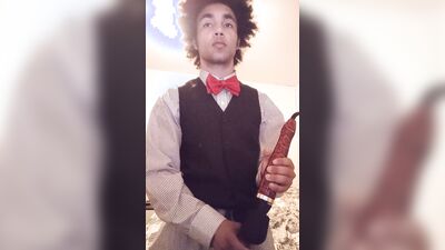 Femboy in tuxedo touches himself with doxy vibrator