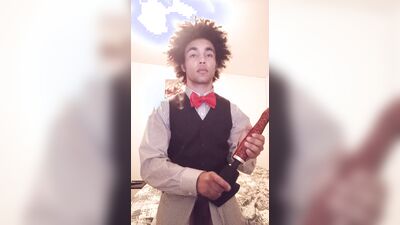 Femboy in tuxedo touches himself with doxy vibrator