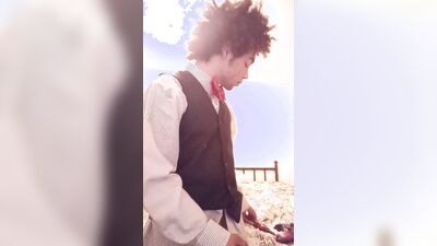 Femboy in tuxedo touches himself with doxy vibrator