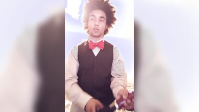 Femboy in tuxedo touches himself with doxy vibrator