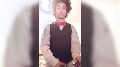 Femboy in tuxedo touches himself with doxy vibrator