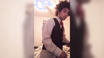 Femboy in tuxedo touches himself with doxy vibrator
