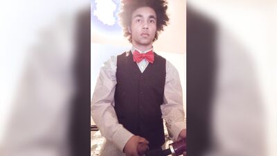 Femboy in tuxedo touches himself with doxy vibrator