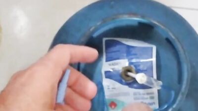 inflating the boy's cock with the gas canister.