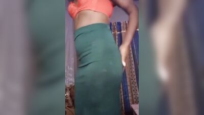 Kenyan crossdresser stripping, stroking dick and fingering her nice ass