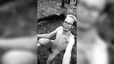 Slender man running around the forest completely naked black and white video
