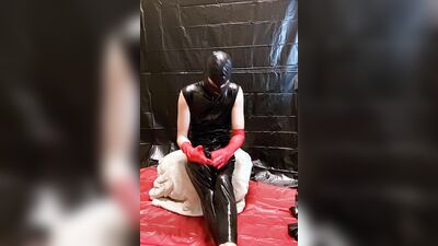 Latex catsuit and Red Latex Gloves