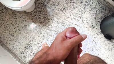 I went into the club bathroom and gave a hot handjob with my finger in my ass, very horny