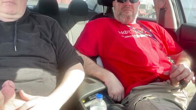 Stroking our Cocks In car in a parking lot