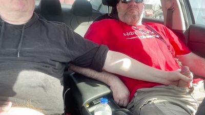 Stroking our Cocks In car in a parking lot