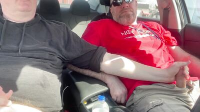 Stroking our Cocks In car in a parking lot