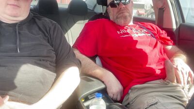 Stroking our Cocks In car in a parking lot