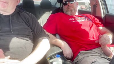 Stroking our Cocks In car in a parking lot