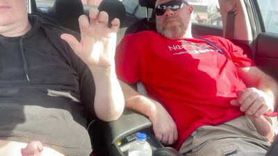 Stroking our Cocks In car in a parking lot